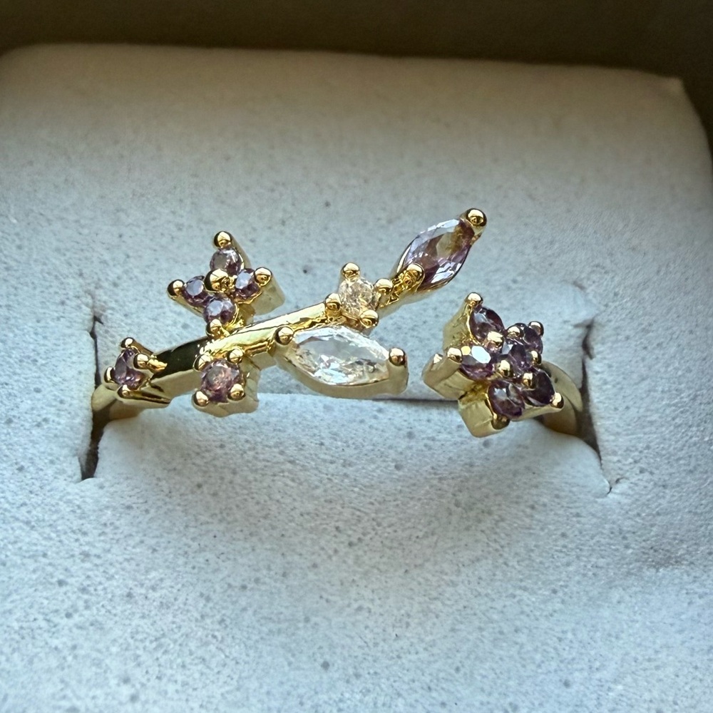 NWT Pretty Bird Jewelry Gold Plated adjustable ring with light purple stones